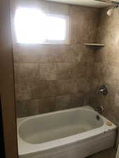 Back House Bathroom with shower / bath combination