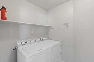 Laundry room featuring washing machine and dryer