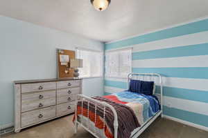 Bedroom featuring carpet floors
