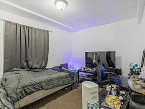Bedroom featuring carpet flooring