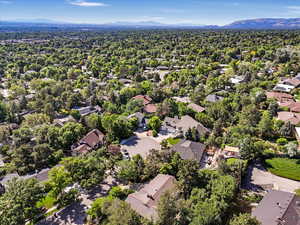 Aerial view of residential area featuring a mountain backdrop