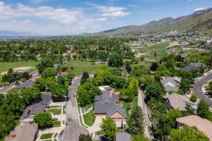 Aerial perspective of suburban area with a mountain backdrop