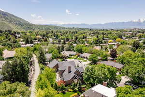 Aerial view of residential area featuring mountains
