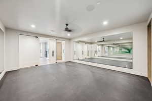 Spare room with ceiling fan and recessed lighting