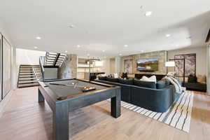 Game room featuring billiards table, light wood-style floors, and recessed lighting