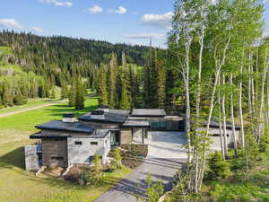 View of patio / terrace featuring a wooded view