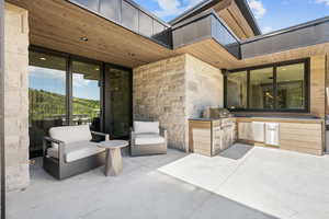 View of patio with area for grilling