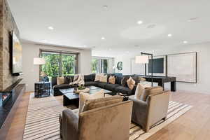 Living area featuring recessed lighting and light wood-type flooring
