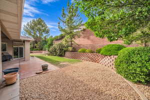 View of yard with a patio