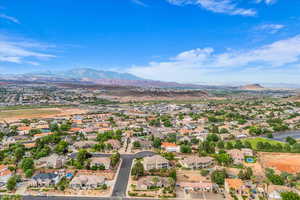 Aerial view of residential area with a mountain backdrop