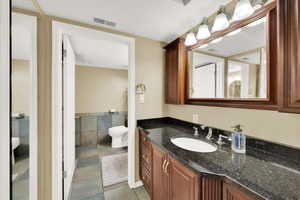 Bathroom featuring vanity and tile patterned flooring