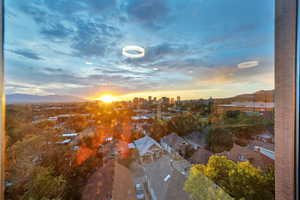 Aerial view at dusk of a mountain view and a view of city