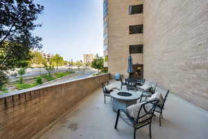 View of patio / terrace featuring an outdoor fire pit