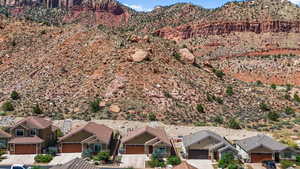 View of mountain backdrop with nearby suburban area