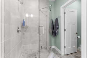 Bathroom featuring a shower stall