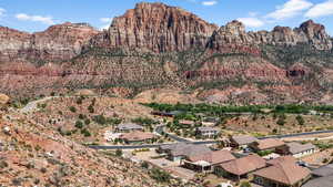 View of mountain backdrop with nearby suburban area