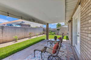Fenced backyard featuring a patio area