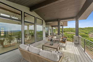Wooden deck featuring an outdoor hangout area