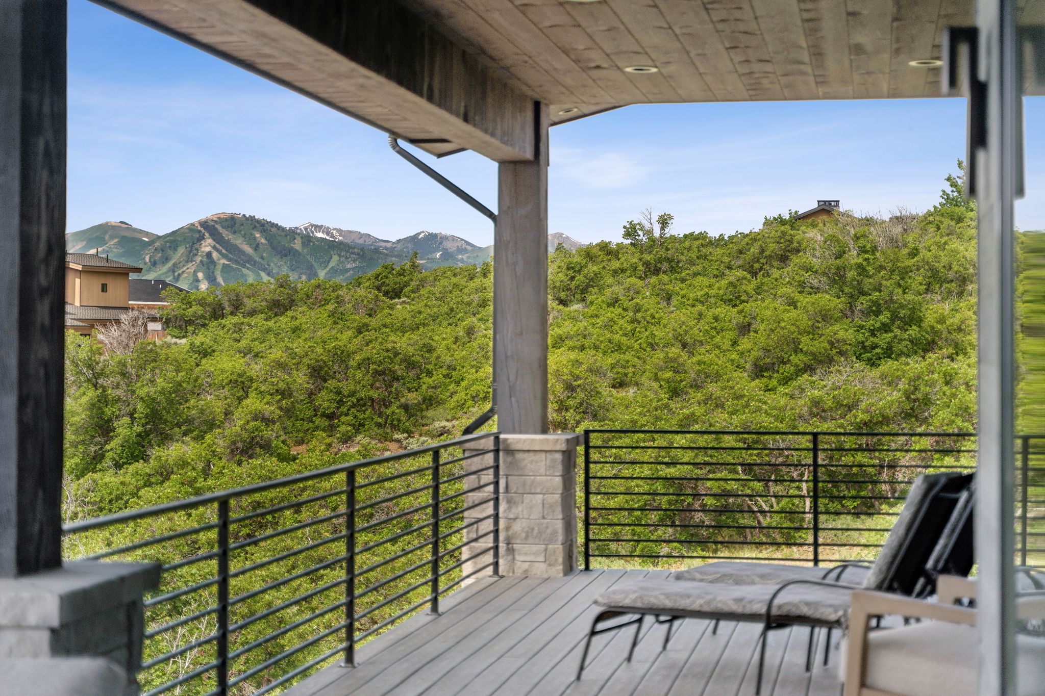 Wooden terrace featuring a mountain view