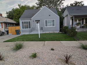 Bungalow-style home featuring roof with shingles