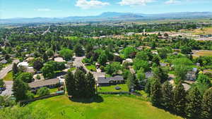 Aerial view of residential area with a mountainous background