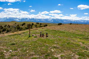 View of mountain background featuring rural landscape
