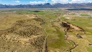 View of property location featuring a water and mountain view and rural landscape