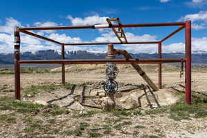View of yard with a mountain view and a rural view