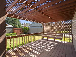 Deck featuring a pergola