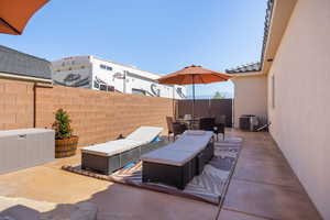 View of patio / terrace featuring an outdoor living space and a mountain view