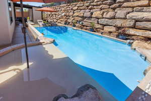 View of pool featuring a patio area