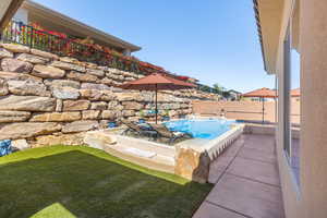 View of swimming pool featuring a patio