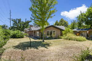 View of front of house with a front yard
