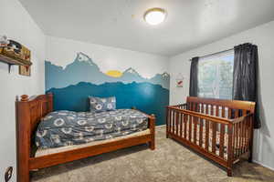 View of carpeted bedroom