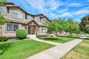 View of adjoining property on south side. HOA covers water, sewer, gas, exterior maintenance and landscaping