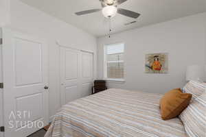 Bedroom with a closet and ceiling fan