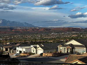 View of mountain backdrop with nearby suburban area
