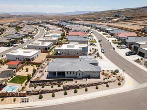 Aerial view of residential area featuring a mountainous background