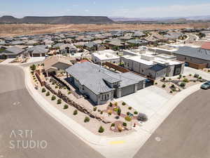 Aerial view of residential area featuring a mountain backdrop
