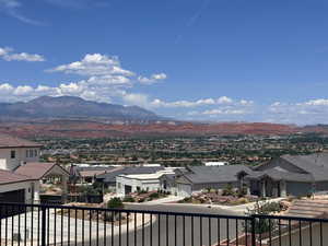 View of mountain background featuring nearby suburban area