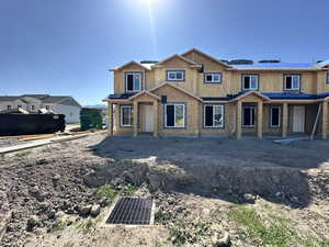 Property in mid-construction with solar panels