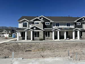 View of front of house featuring stone siding