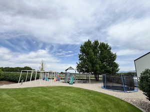 Community play area featuring a trampoline