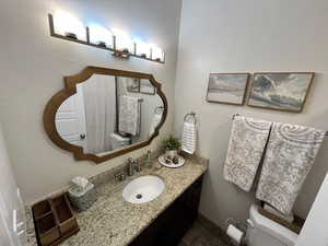 Bathroom with toilet and vanity
