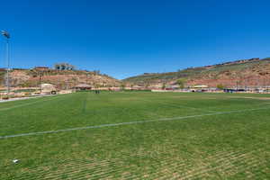 View of community featuring a sport area and a mountain view