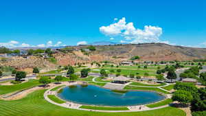 View of home's community with a water and mountain view