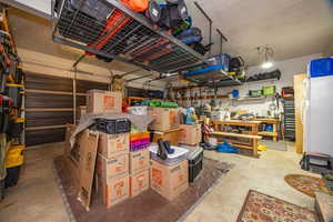 Garage featuring a workshop area