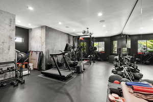 Gym featuring recessed lighting