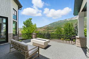 Patio / terrace with a mountain view