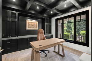 Home office featuring coffered ceiling, recessed lighting, beamed ceiling, and light wood-style floors